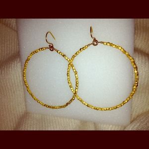 Gold toned hammered hoop earrings