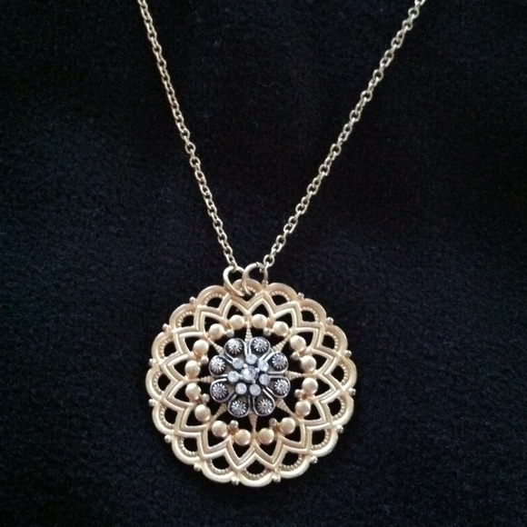 Banana Republic medallion chain.