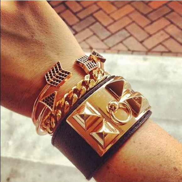 Gold tone and black rhinestone arrow bracelet