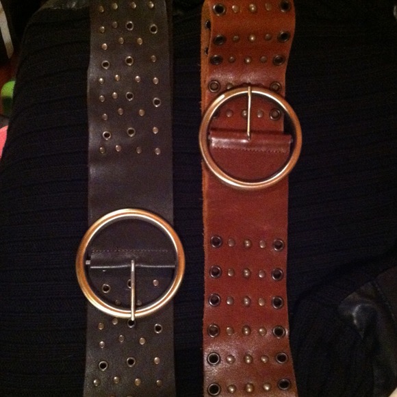 Wide leather belts with grommets
