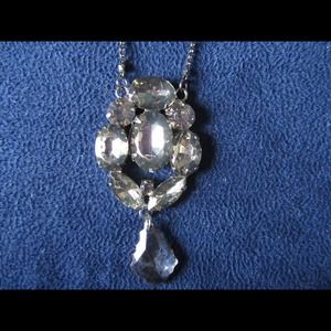 Stunning gemstone pendant with attached chain!