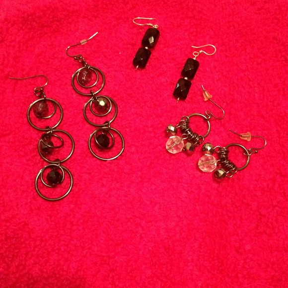 Three pairs of earrings.