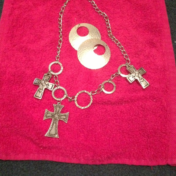 Cross necklace and earrings.