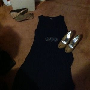 A black dress with brown and blue details