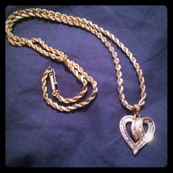 10k gold necklace with small heart/diamond chips.
