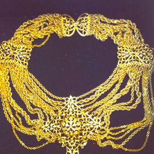 Gold necklace by Monet