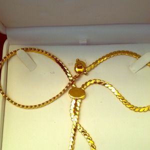 Gold necklace by Monet