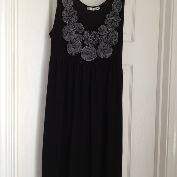 Black dress w/Rose embellishments. Worn once.