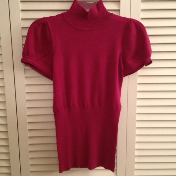 Raspberry mock turtle neck w/buckle accents on slv