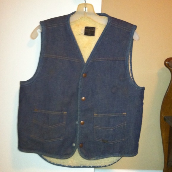 Blue denim fleece lined vest.