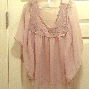 Look fab in this sheer shirt.