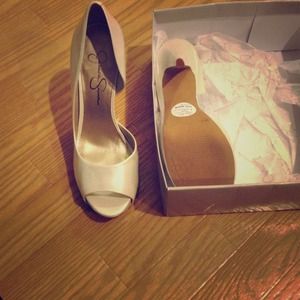 New Jessica Simpson heels. Size 8.5 white pearl