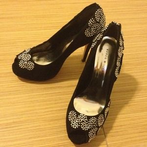 Black peep toe pumps with crystals