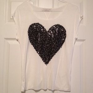 White top with black sequence heart size M