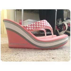 Bebe Sport high wedge flip flop.