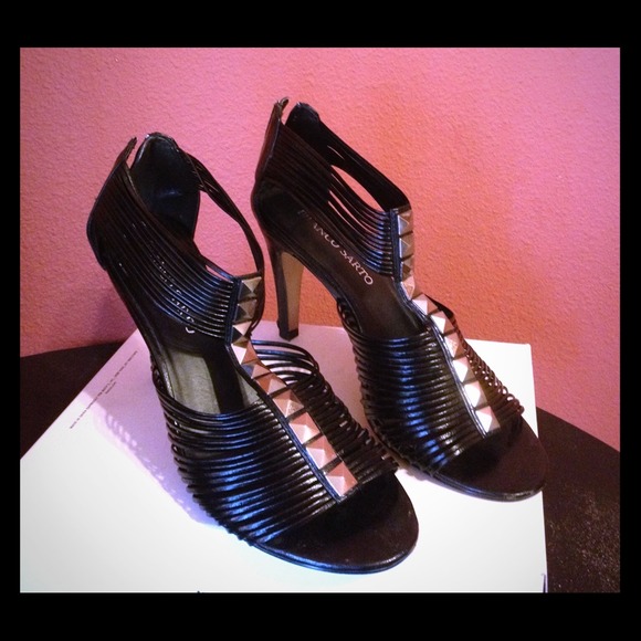 black with silver design, zipper in back