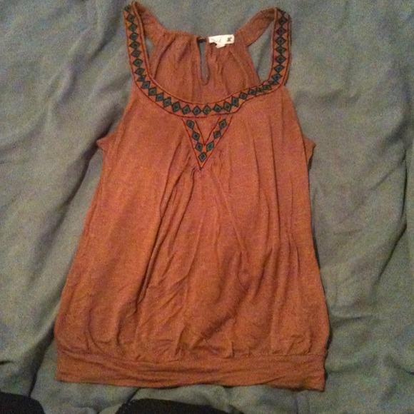 Mine.... Burnt orange shirt worn only once!