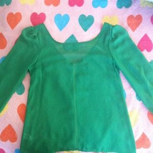 Green chiffon shirt with low back and yellow zippe