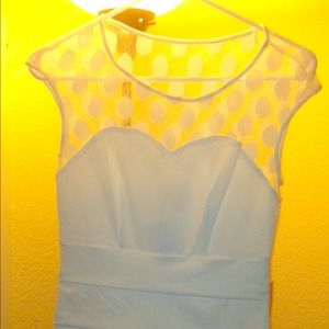 White knee length dress