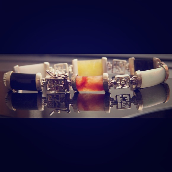 Sterling Silver multi shades of Jade braclet