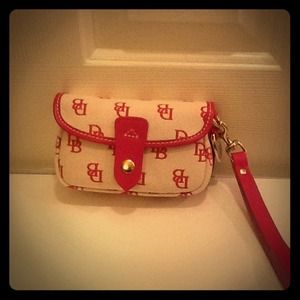 Dooney and Bourke wristlet. Pink.
