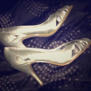 Size 7, open toe, silver pumps. GREAT condition!