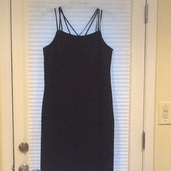 Black multi strapped cocktail dress.