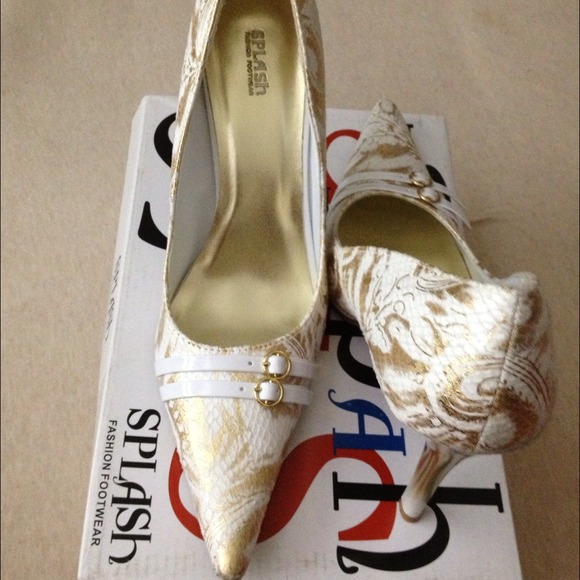A pair of White/Gold Snake Suede Stilettos