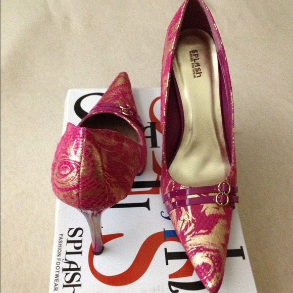 A pair of Fuchsia/Gold Snake Suede Stilettos!!