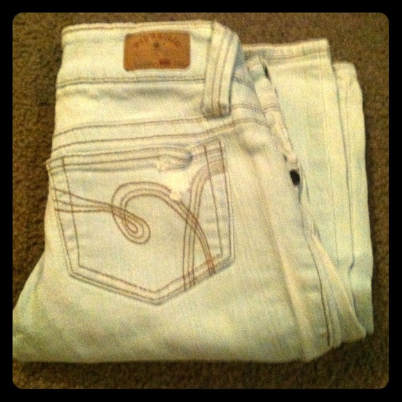 Hydraulic distressed jean reg. length light wash