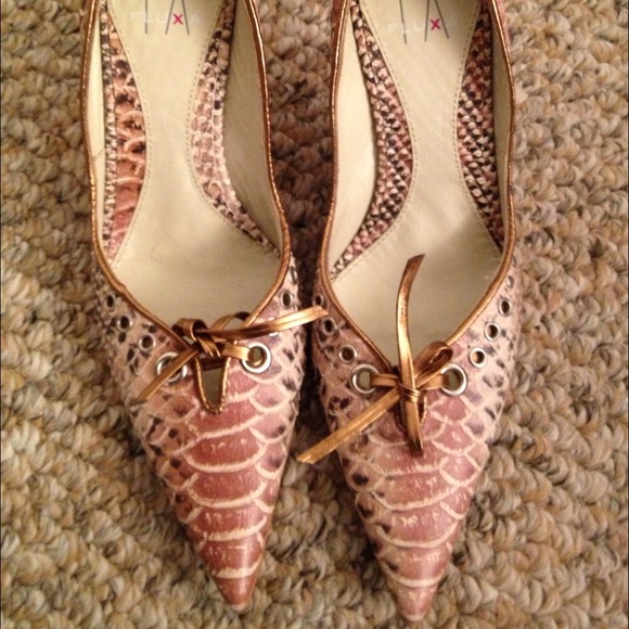 Brand new snakeskin pumps