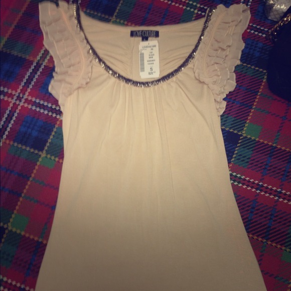 Beautiful top with beading neckline.