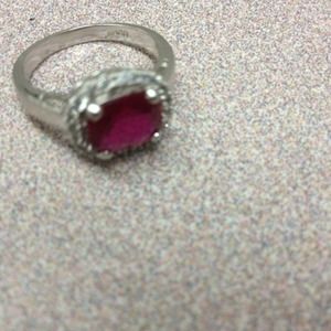 Simulated ruby and diamond ring.