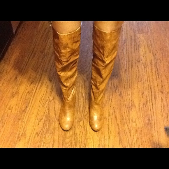 New in box over the knee boot.