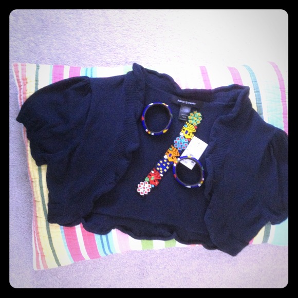 Navy blue cap sleeve sweater.