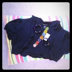 Navy blue cap sleeve sweater.