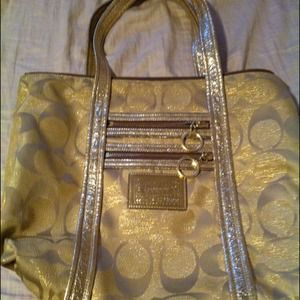 Used Coach poppy gold shimmer op art glam