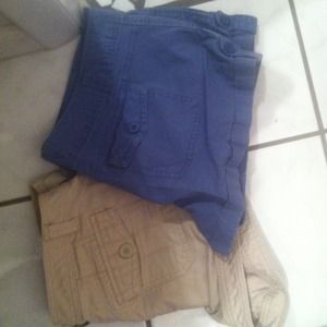 2 pairs of shorts.1 pair tan, 1 pair blue.