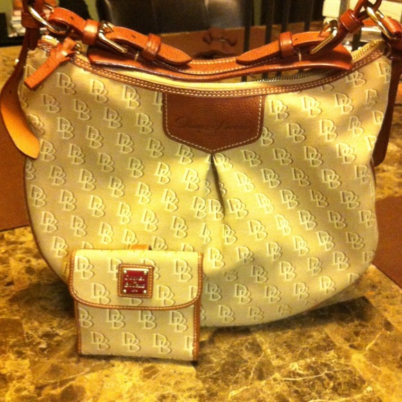 "Traded" Dooney & Bourke handbag w/wallet.