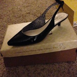 Black patent leather sling backs