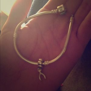 SOLD Pandora bracelet with charm