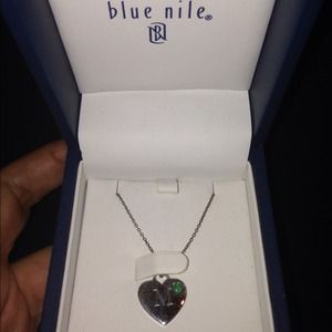 Sterling silver with emerald