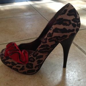 Steve Madden leopard pumps.