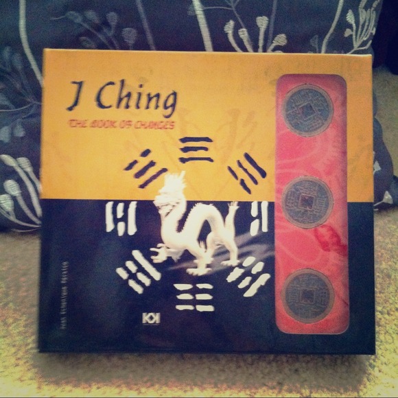 I Ching book and 3 coins
