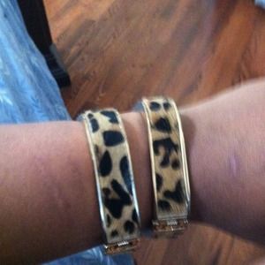 Pony cheetah and gold tone bangles