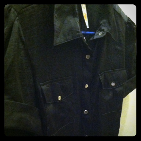 Silk black dress up top. Button downs the front