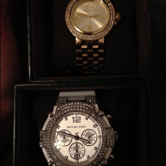 Two authentic Michael Kors watches.