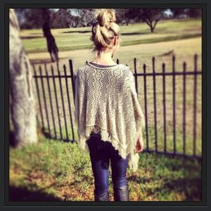 Beautiful fringed poncho top