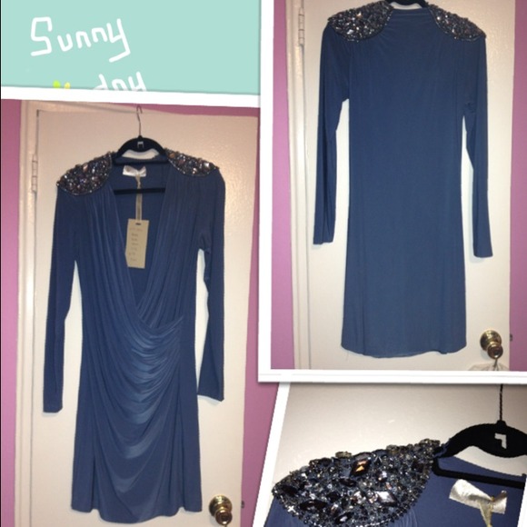 Mignon grey with shoulder studded detail.