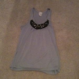 Grey tank with detachable cloth with jewels.